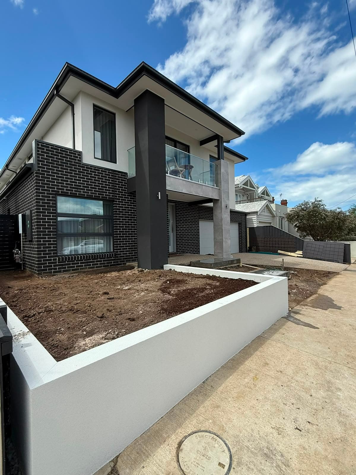 Contemporary landscape with concrete edging and plants